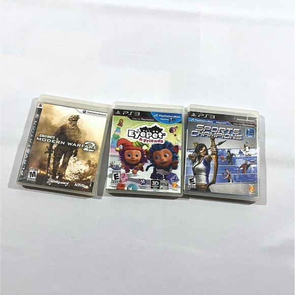 Playstation 3 ps3 Video Game Lot 3 COD Modern Warfare 2 Eye Pet Sports Champions - Picture 1 of 6